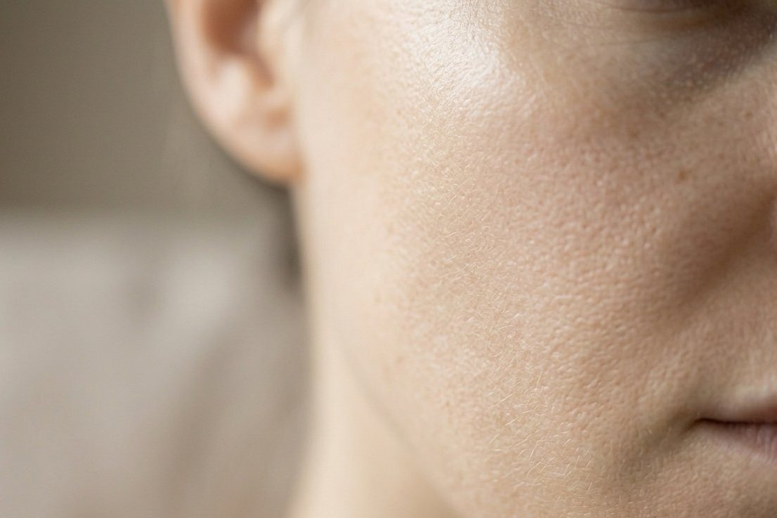 Close detail of healthy skin texture in soft light