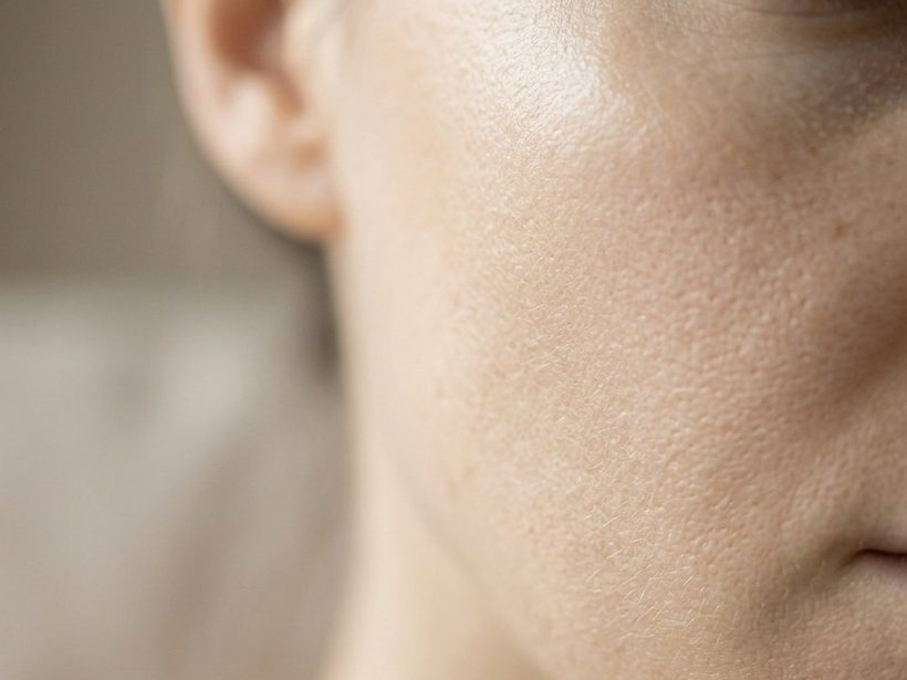 Close detail of healthy skin texture in soft light